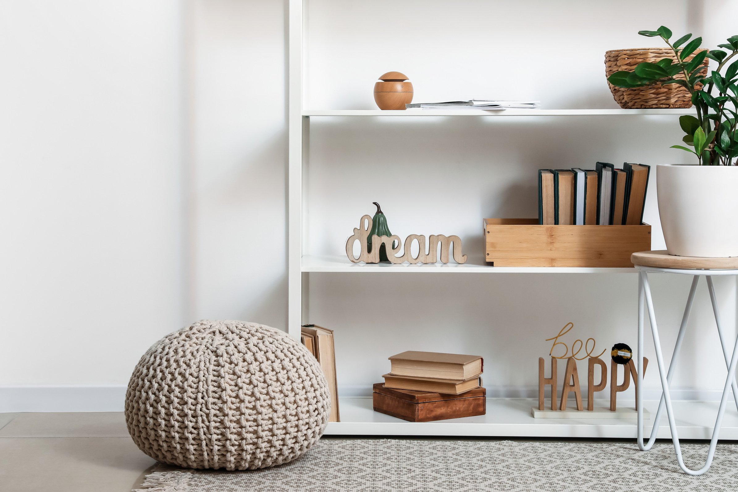 Modern Book Shelf with Decor near Light Wall